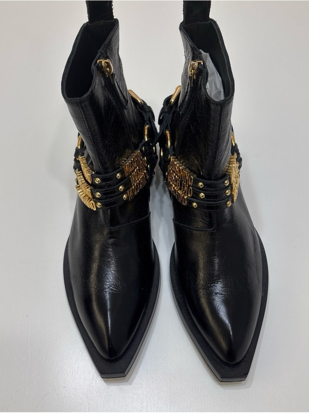 Never worn Moschino Black Leather Ankle Boots with Gold Logo Straps - Picture 2 of 6